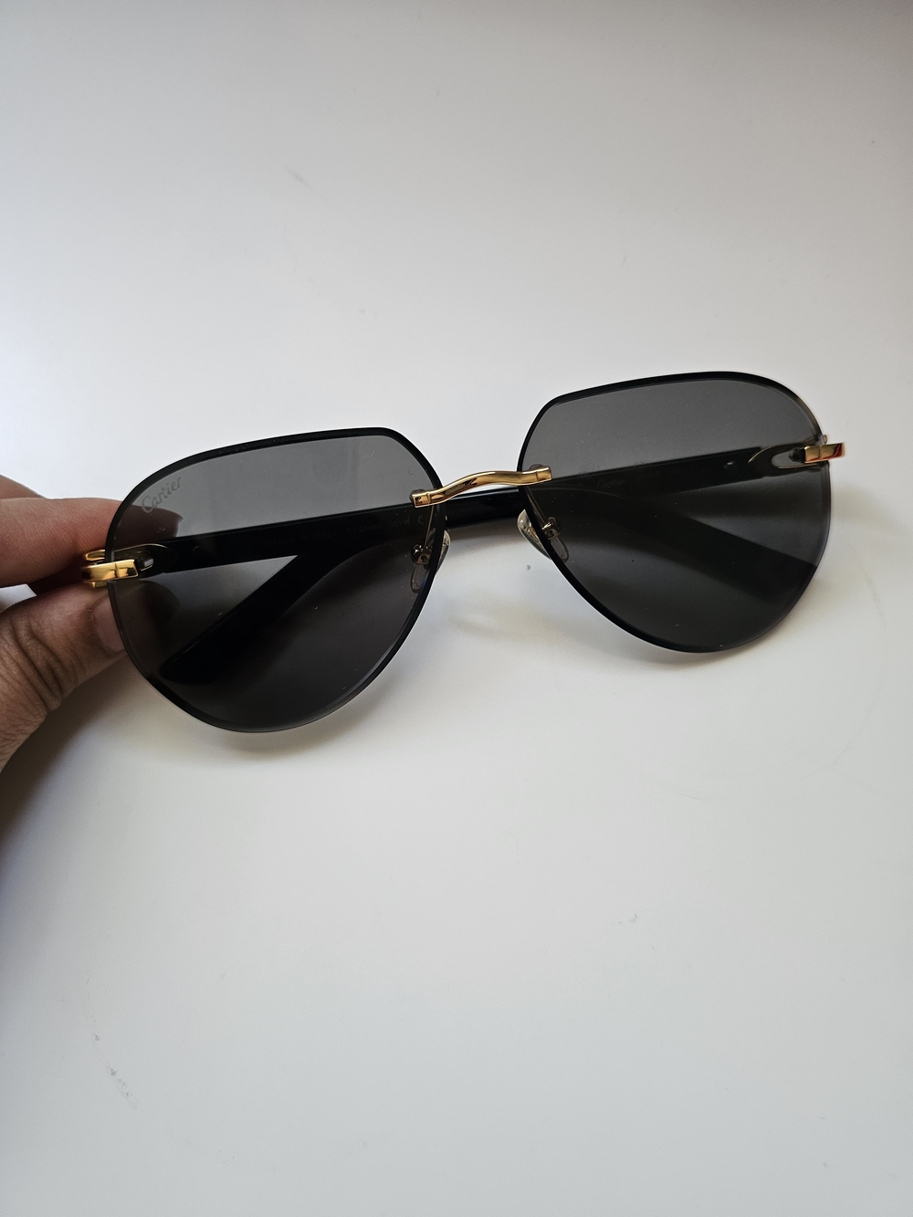 Cartier Black Lensed Sunglasses with Gold Accents